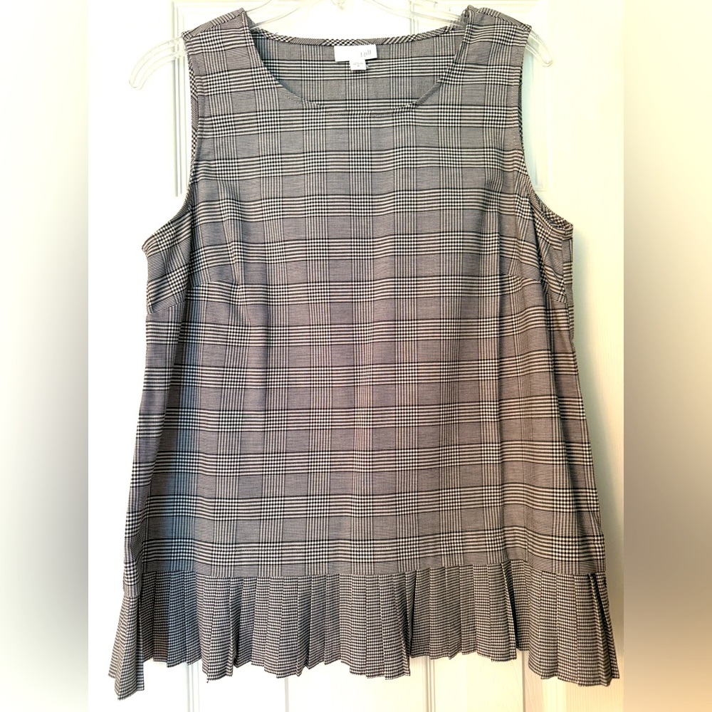 J.Jill sleeveless blouse in houndstooth print with pleated ruffle trim.